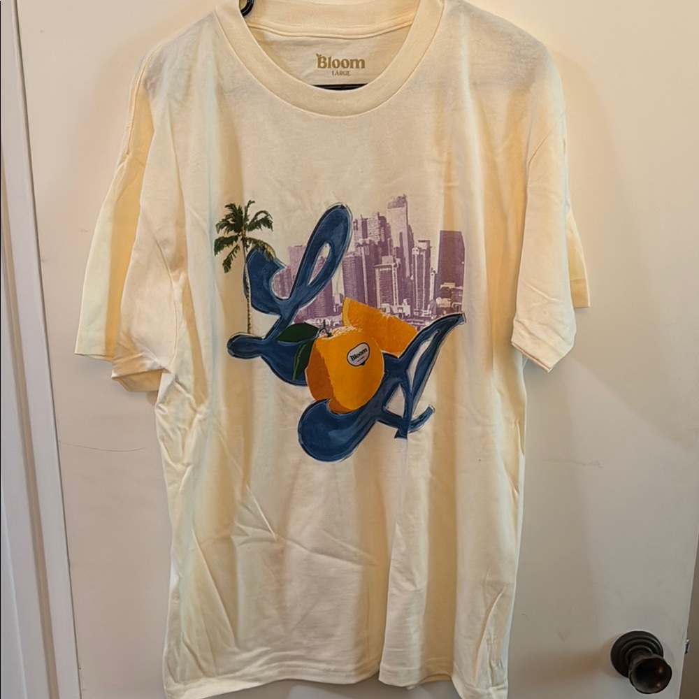 Bloom Graphic T-Shirt with Cityscape Design